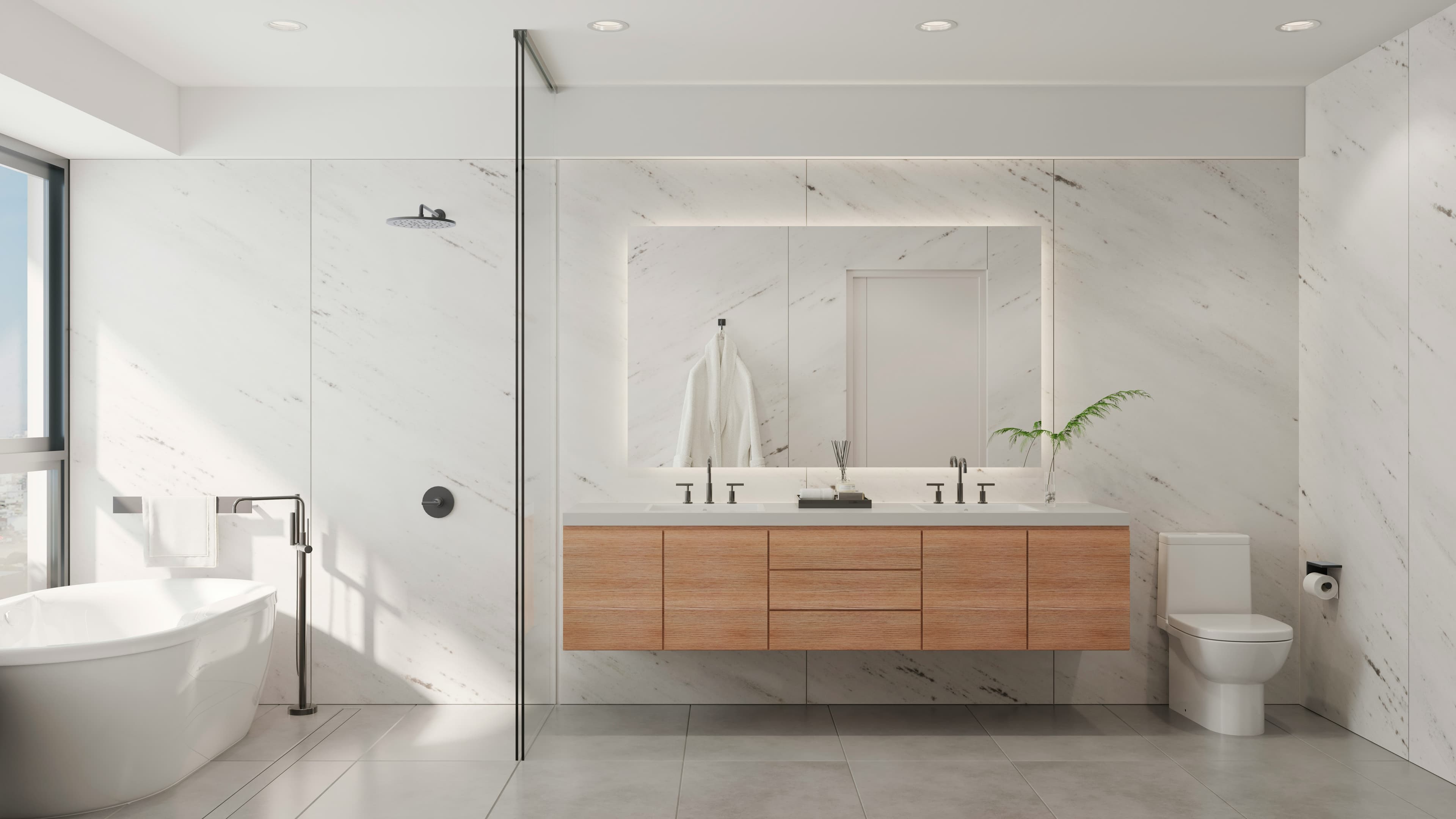 Lavabo, küvet ve aynalı dolaptan oluşan yenilenmiş banyo alanı